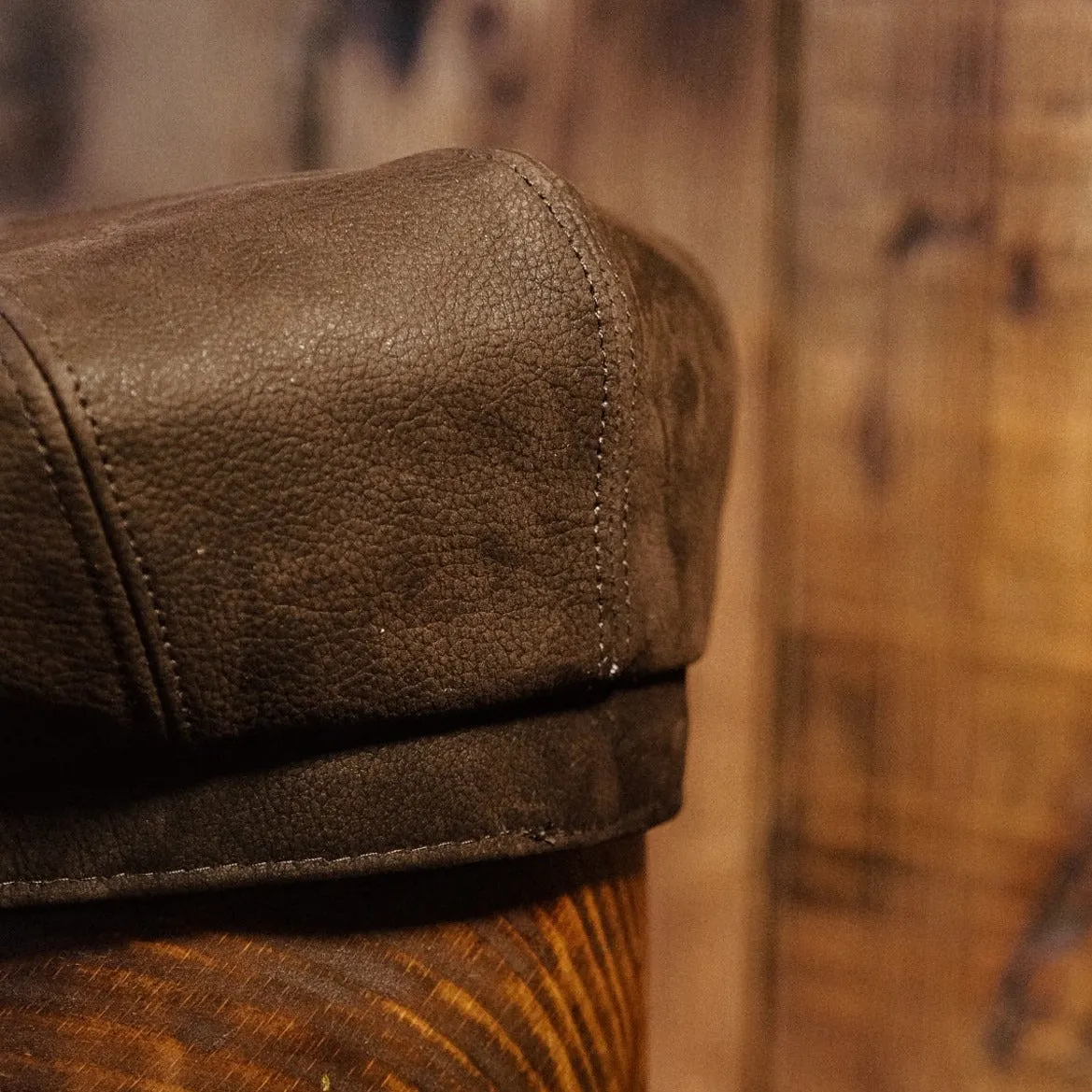 Eight Piece Brown Leather Newsboy Cap