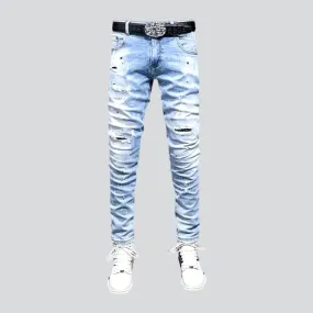 Men's paint-splattered jeans